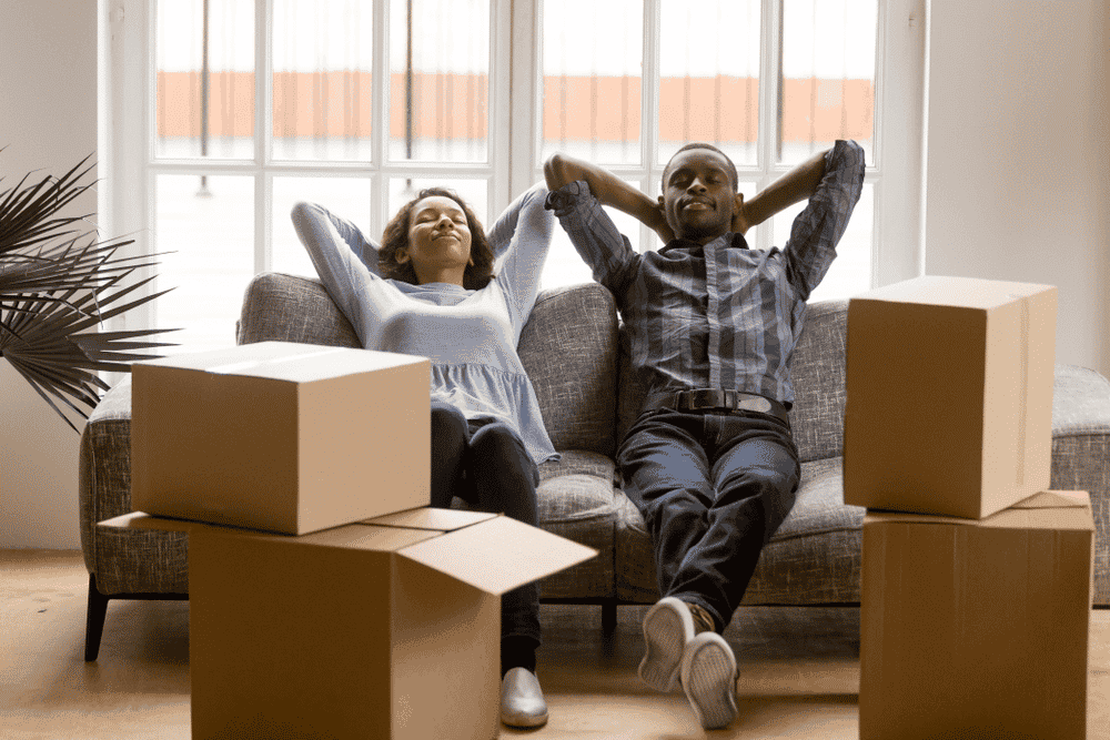 couple relaxing during move