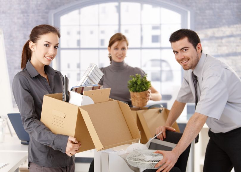 Employees packing up to prepare for an Office Move